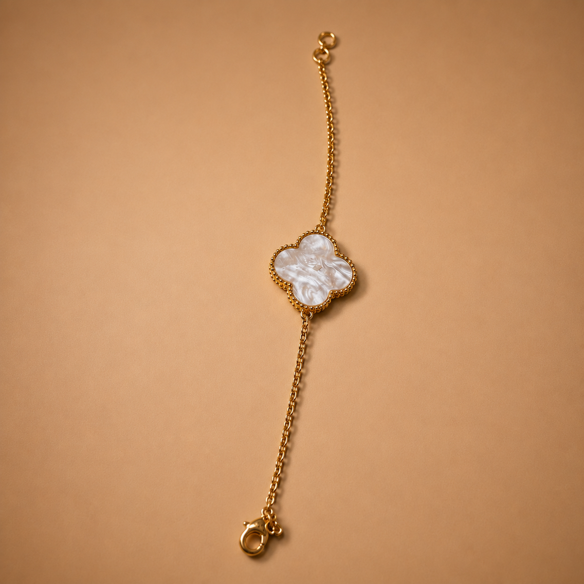 Gold and white bracelet